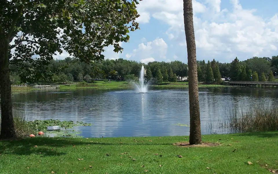 Lake Lily and its fountain from the lawn at Lake Lily Park, Maitland